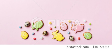 holiday preparation Multi colors Easter eggs with cookies on colored background . Pastel color Easter eggs. holiday concept with copy space holiday preparation Multi colors Easter eggs with cookies on colored background . Pastel color Easter eggs. holiday concept with copy space 136159983