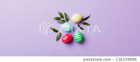 Colorful Easter eggs with spring flower leaf isolated over white background. Colored Egg Holiday border 136159996
