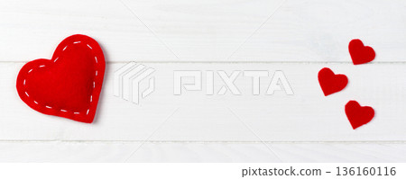 Hearts on white wood background. Valentines day background. banner for advertising and design, promo top view with copy space Hearts on white wood background. Valentines day background. banner for advertising and design, promo top view with copy space 136160116
