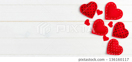 Valentines day background with handmade toy hearts on wooden table Valentines day background with handmade toy hearts on wooden table 136160117
