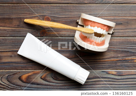 Mouthwash and other oral hygiene products on colored table top view with copy space. Flat lay. Dental hygiene. Oral care kit. Dentist concept Mouthwash and other oral hygiene products on colored table top view with copy space. Flat lay. Dental hygiene. Oral care kit. Dentist concept 136160125
