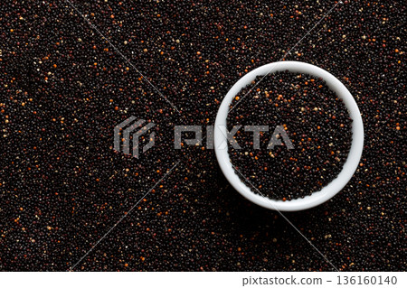 black quinoa grain in wooden bowl background and texture of gluten free top view 136160140