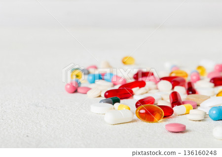 Many different colorful medication and pills perspective view. Set of many pills on colored background Many different colorful medication and pills perspective view. Set of many pills on colored background 136160248