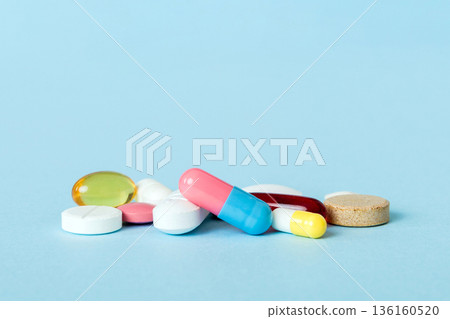 Many different colorful medication and pills perspective view. Set of many pills on colored background Many different colorful medication and pills perspective view. Set of many pills on colored background 136160520