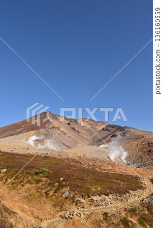 Jigokudani and volcanic smoke of Mount Asahidake, Hokkaido 136160559