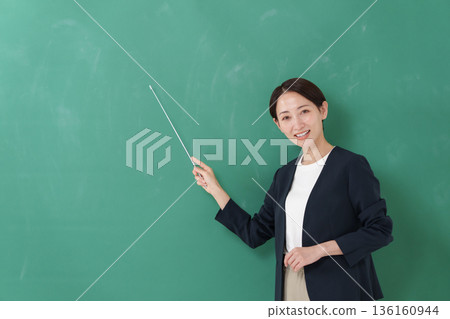 Female teacher smiling Female teacher smiling 136160944