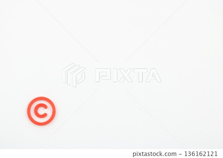 A simple red copyright mark on a white background 136162121
