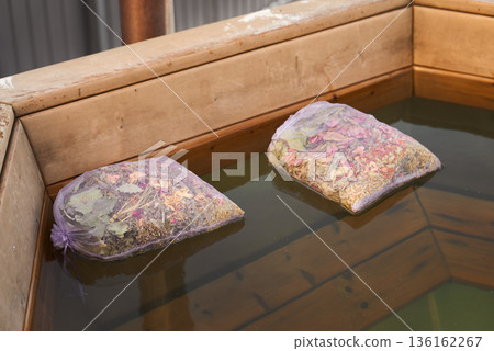 Relaxing Bath With Floating Flowers And Peaceful Wooden Surroundings Inspired By Slow Living Relaxing Bath With Floating Flowers And Peaceful Wooden Surroundings Inspired By Slow Living 136162267