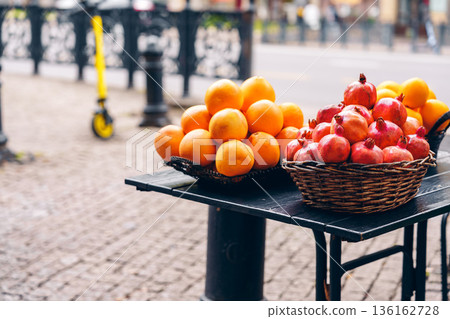 Fresh fruits on a street table in an urban market during daylight hours Fresh fruits on a street table in an urban market during daylight hours 136162728
