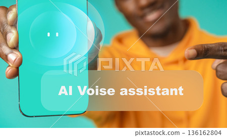 Person shows smartphone with voice assistant feature on bright background in indoor setting Person shows smartphone with voice assistant feature on bright background in indoor setting 136162804