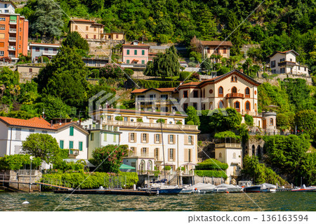 Multicolor houses building architecture on lake Como Italy city. Multicolor houses building architecture on lake Como Italy city. 136163594