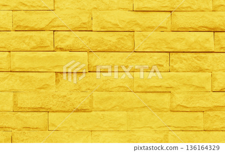 Golden yellow brick wall texture with vintage style pattern for background and design art work. 136164329
