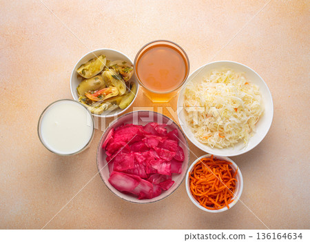 Fermented food promoting gut health with natural probiotics and beverages top view 136164634