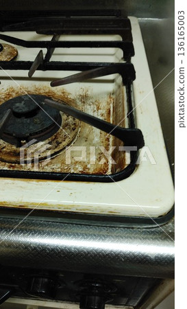 Oil stains on a gas stove (close-up) Oil stains on a gas stove (close-up) 136165003