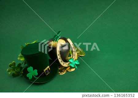 St. Patrick's day celebration with leprechaun hat, gold, shamrocks 136165352