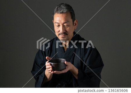 Senior men who drink tea Senior men who drink tea 136165606