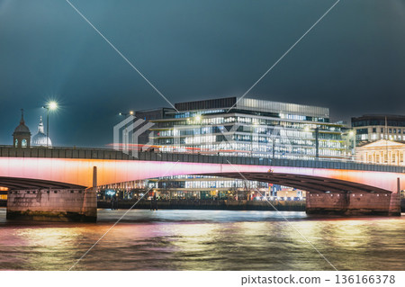 The River Thames and the illuminated London Bridge in England 136166378