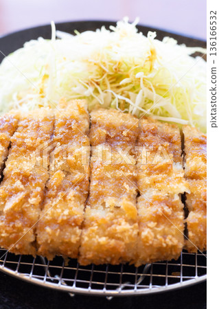 Delicious jumbo minced meat cutlet with sauce and shredded cabbage 136166532