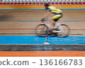 Cyclist cycling on the cycle track velodrome on bicycle with motion blur. High quality photo 136166783