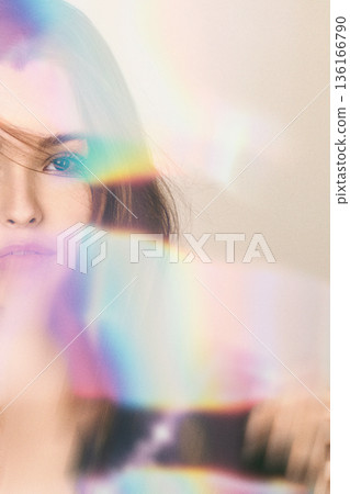Woman experiencing prism light flares and colorful bokeh 136166790