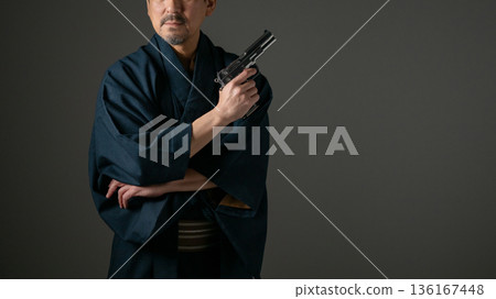 Man with a pistol 136167448