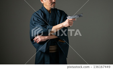 Man with a pistol Man with a pistol 136167449