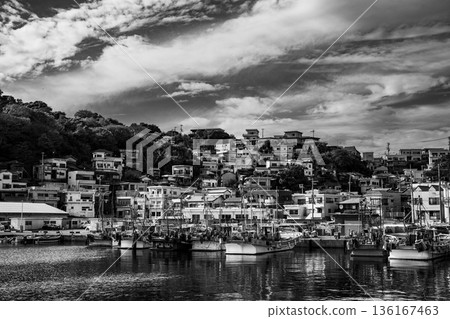 Scenery of a port town on a slope in Japan with ships lined up in the harbor (monochrome) Scenery of a port town on a slope in Japan with ships lined up in the harbor (monochrome) 136167463
