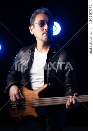 Man playing guitar 136167672