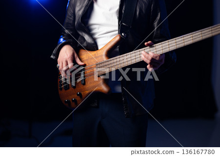 Man playing guitar 136167780