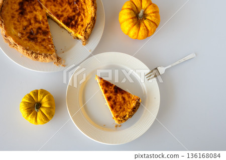 Slice of Homemade Pumpkin Cheesecake 136168084