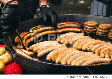 Grilled Sausage with Spices at Christmas Fair Grilled Sausage with Spices at Christmas Fair 136168179