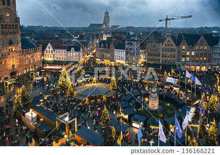 Christmas market decorated and illuminated in Bruges, Belgium. 136168221