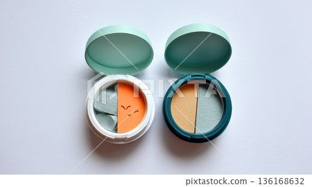 Two Stylish Cosmetic Containers with Unique Color Palettes on a Simple Background 136168632