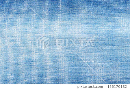 Blue denim textile background showing worn fabric texture Blue denim textile background showing worn fabric texture 136170182