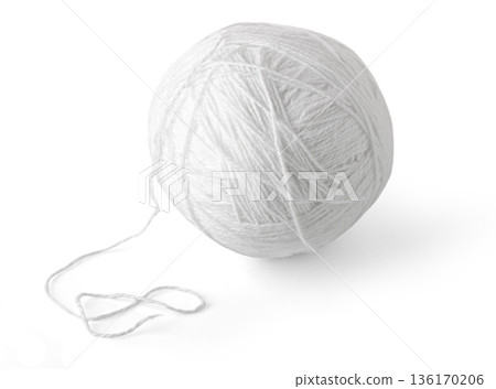 White yarn ball unrolling for knitting project 136170206