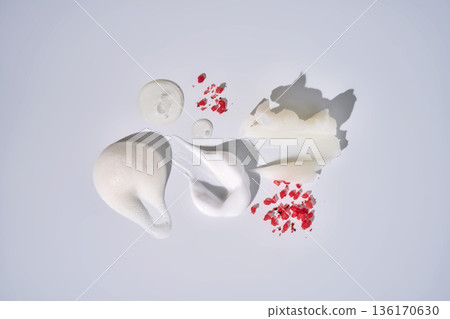 Skincare product swatches with various textures and red granules Skincare product swatches with various textures and red granules 136170630