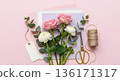 Galentines Day floral flat lay with roses and ranunculus 136171317