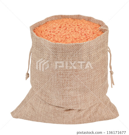 Lentils in a cloth bag, isolate on a white background 136171677