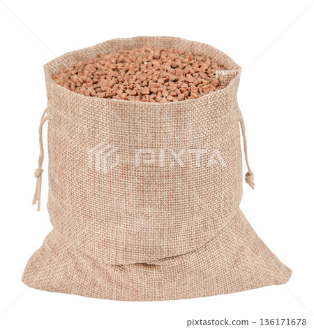 Buckwheat in a cloth bag, isolated on a white background Buckwheat in a cloth bag, isolated on a white background 136171678