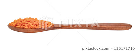 Lentil groats in a brown wooden spoon isolate on a white background Lentil groats in a brown wooden spoon isolate on a white background 136171710