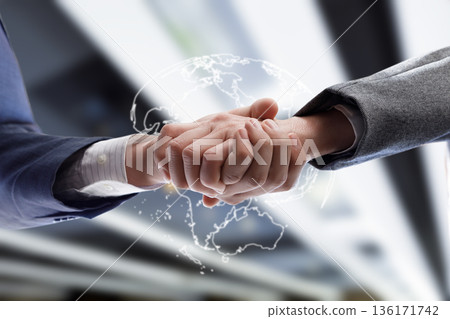 Worldwide handshake in business. 136171742