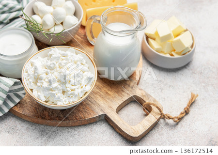 Collection of various fresh dairy products on kitchen board Collection of various fresh dairy products on kitchen board 136172514