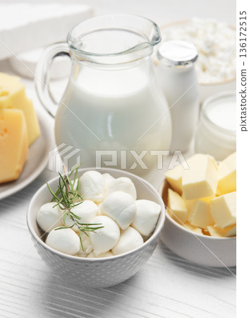 Assortment of fresh dairy products on white table 136172515