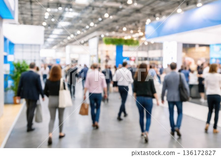 Busy Crowd Walking Through Modern Exhibition Hall at International Trade Show 136172827