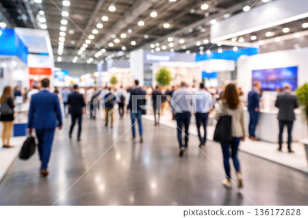 Large Group of Professionals Attending Business Expo in Convention Center 136172828