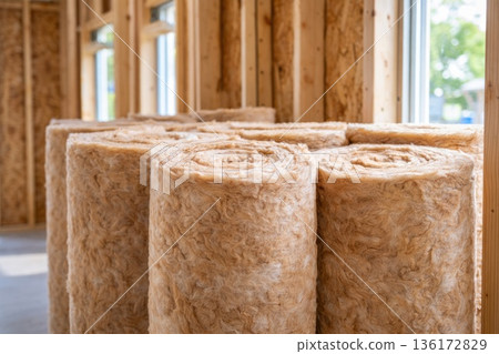 Natural Fiber Insulation Rolls Installed Inside Wooden House Frame Natural Fiber Insulation Rolls Installed Inside Wooden House Frame 136172829