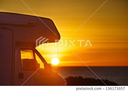Camper car on beach at sunrise Camper car on beach at sunrise 136173057