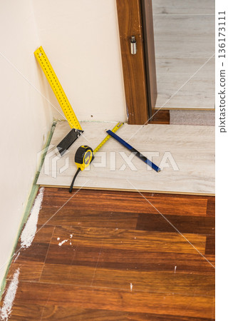 Renovations tools, tape measure, industrial ruler 136173111