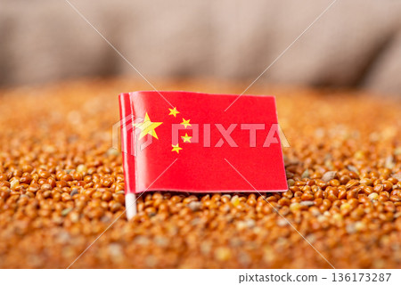 Flag of China on millet grain. Concept of origin of millet grain, agribusiness in China 136173287