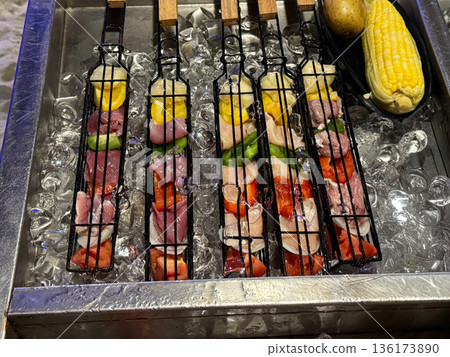 Raw Meat Skewers on Ice Display Raw Meat Skewers on Ice Display 136173890